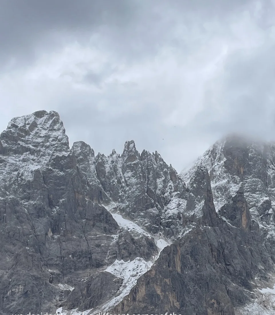The Pale di San Martino under low cloud, first snow on the rock