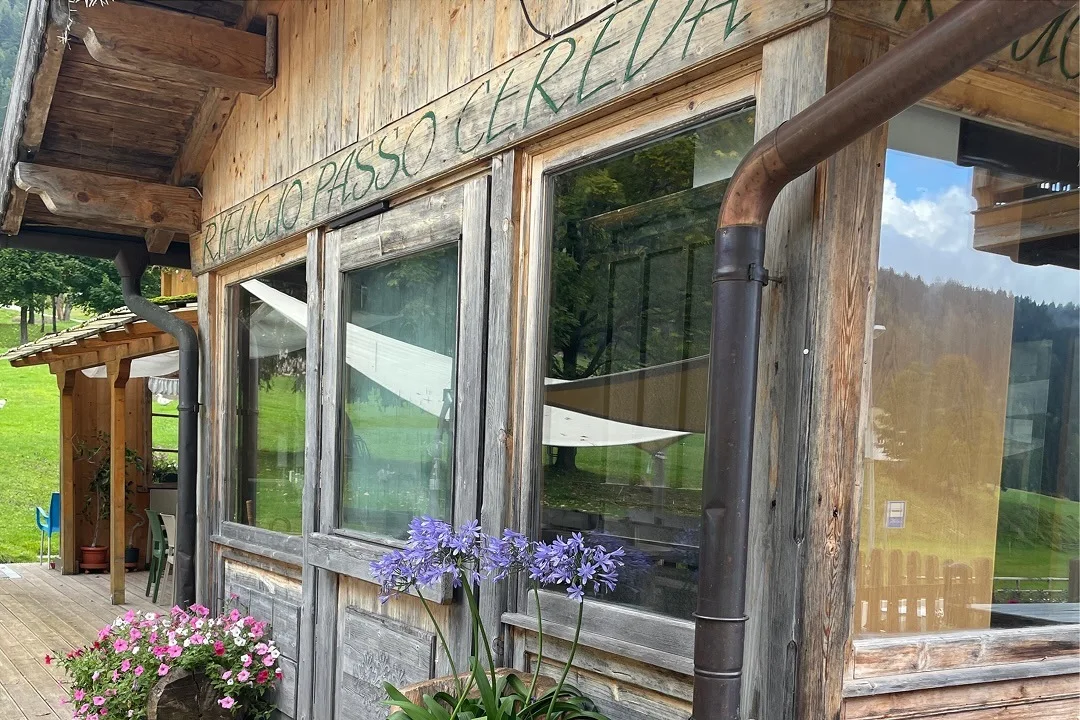 The wooden façade of Rifugio Passo Cereda